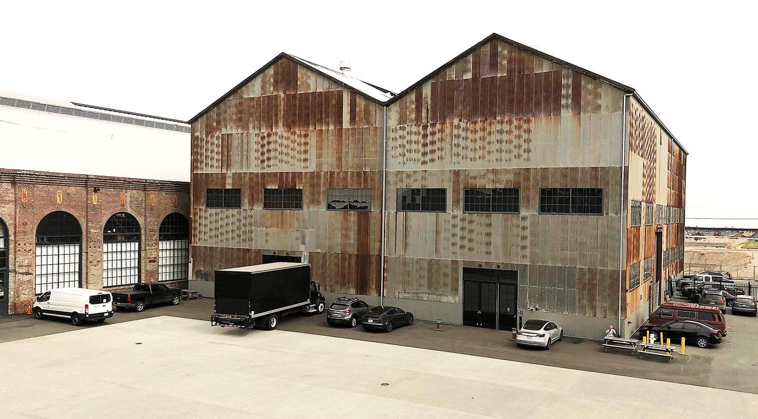Exterior view of rusted metal building at Pier 70, Building 14 in San Francisco